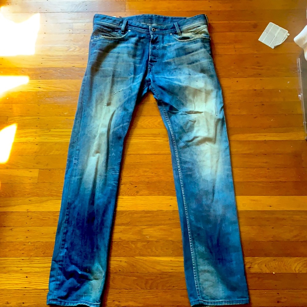 Blue diesel jeans with zipper back pockets